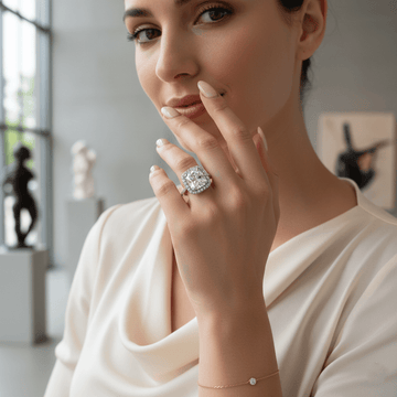 Woman wearing a diamond ring in a blurred indoor setting